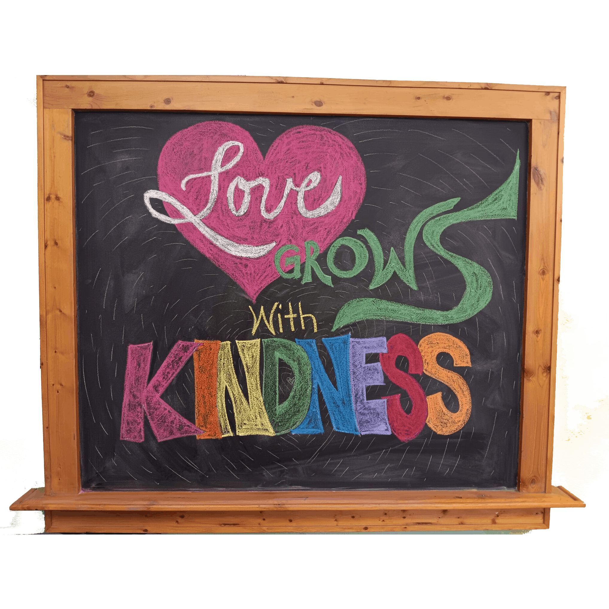 20240210_114803-scaled-1 (1) A chalkboard sign reading "Love grows with kindness